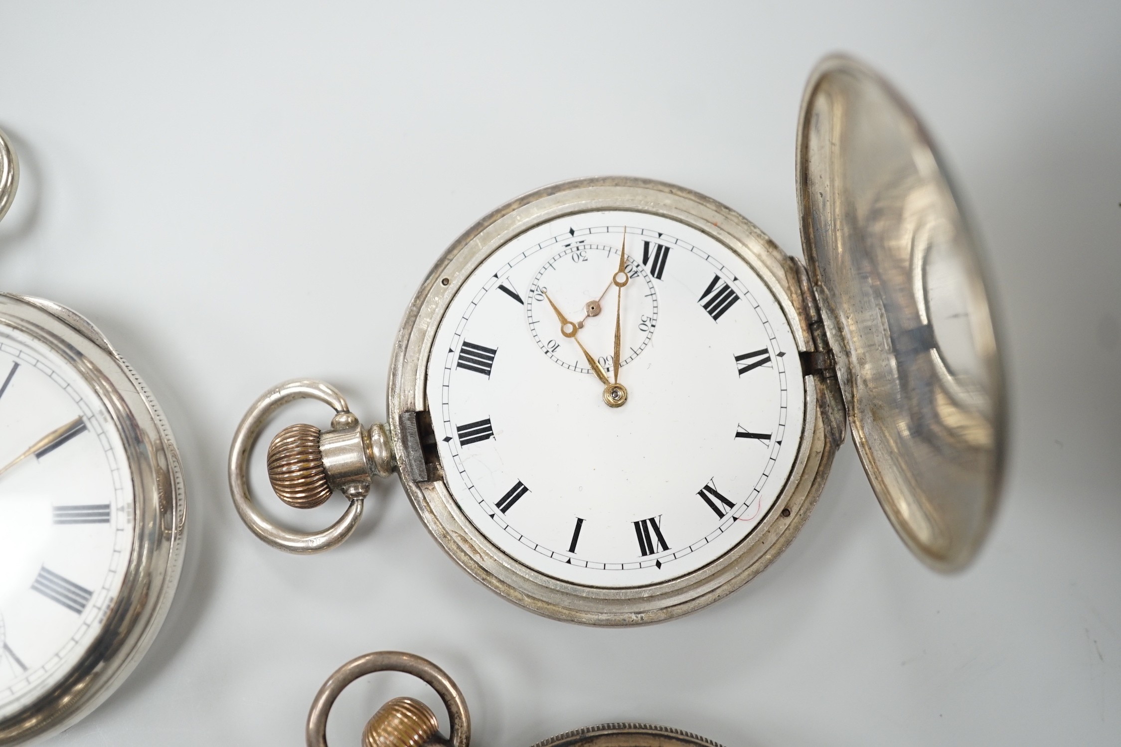 Three assorted Victorian and later silver open face pocket watches, including keywind and keyless and a silver hunter pocket watch.